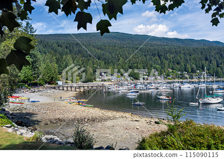 Deep Cove bay area with yacht on the water 115090115