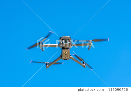 Drone and blue sky 115090726