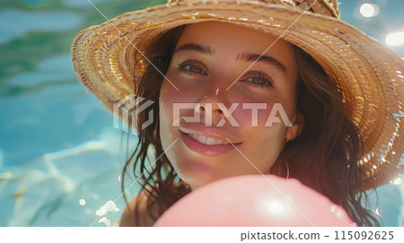 Woman in Straw Hat Holding Pink Balloon Woman in Straw Hat Holding Pink Balloon 115092625