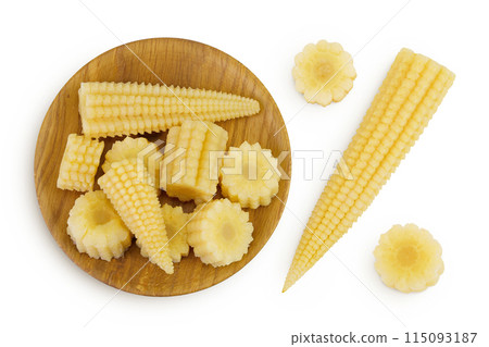 Pickled young baby corn cobs in wooden bowl isolated on white background. Top view. Flat lay 115093187