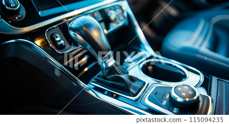 Automatic gear stick of a modern car. Modern car interior details. Close up view. Car detailing. Automatic transmission lever shift 115094235