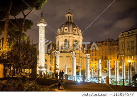 Roman ruins at night in Rome, Italy 115094577