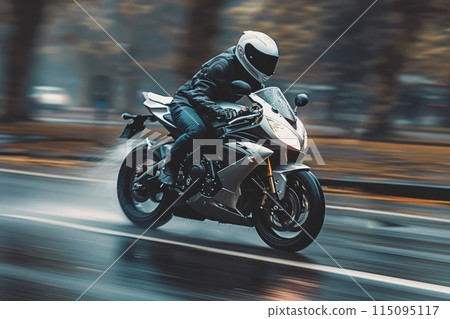 Motorcyclist Speeding on Wet City Street Motorcyclist Speeding on Wet City Street 115095117