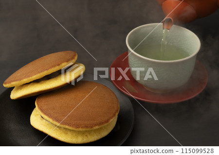 Dorayaki, pouring tea Dorayaki, pouring tea 115099528