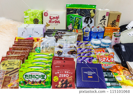Mix collection of snacks, food, souvenirs, supplements, beverages clothing and liquor that are popular in Japan for foreign tourists use for background. 115101068