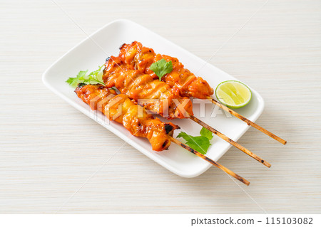 grilled chicken skewer with herbs and spices 115103082