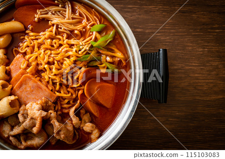 Budae Jjigae or Budaejjigae (Army stew or Army base stew). It is loaded with Kimchi, spam, sausages, ramen noodles and much more 115103083