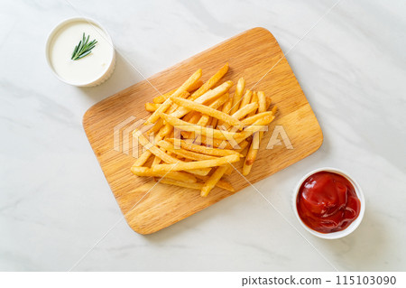 French fries with sour cream and ketchup French fries with sour cream and ketchup 115103090