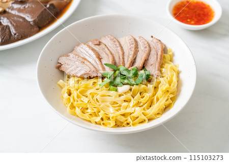 dried duck noodles in white bowl 115103273
