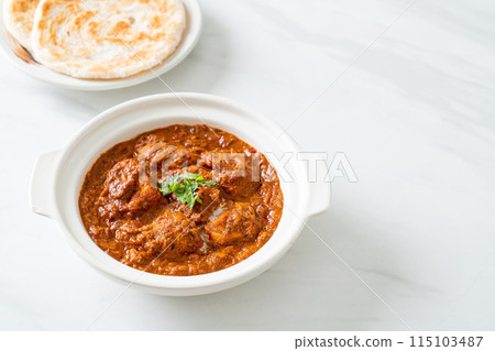 chicken tikka masala spicy curry meat food with roti or naan bread chicken tikka masala spicy curry meat food with roti or naan bread 115103487