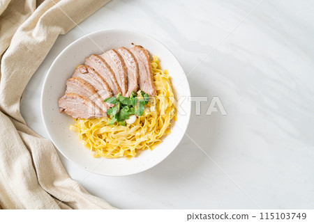dried duck noodles in white bowl 115103749