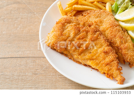 Homemade Breaded Weiner Schnitzel with Potato Chips Homemade Breaded Weiner Schnitzel with Potato Chips 115103933