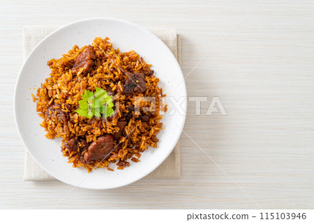 Nasi goreng - fried rice with pork in Indonesia style Nasi goreng - fried rice with pork in Indonesia style 115103946