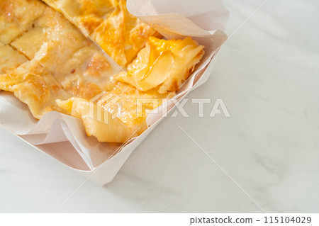 roti with egg and sweetened condensed milk 115104029