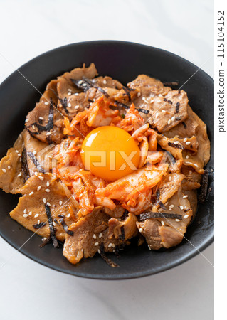 pork bulgogi rice bowl with kimchi and Korean pickled egg 115104152