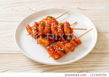 deep fried Korean rice cake (Tteokbokki) skewered with spicy sauce 115104156