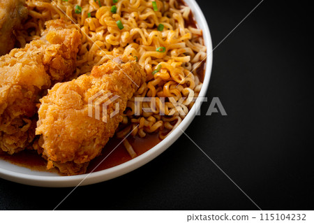 Korean instant noodles with fried chicken or Fried chicken ramyeon 115104232