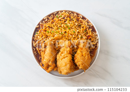 Korean instant noodles with fried chicken or Fried chicken ramyeon 115104233