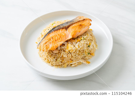 fried rice with grilled salmon fillet steak 115104246