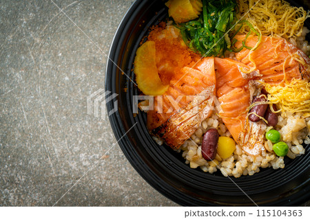grilled salmon with brown rice donburi 115104363