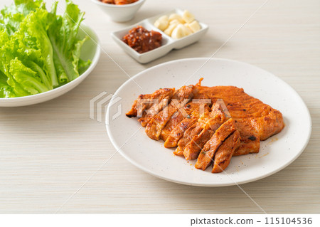 grilled pork marinated Kochujang sauce in Korean style with vegetable and kimchi 115104536