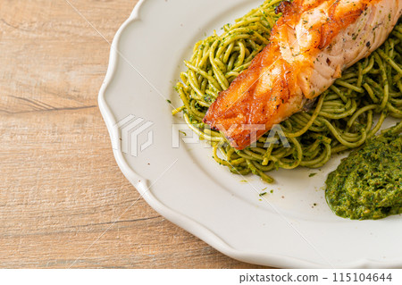 Spaghetti pesto with grilled salmon Spaghetti pesto with grilled salmon 115104644