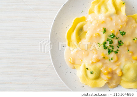 ravioli pasta with corn cheese sauce 115104696