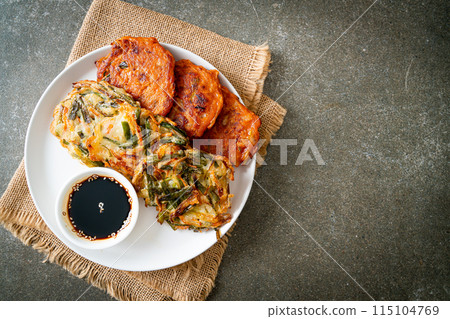 Pajeon or Korean pancake and Korean Kimchi pancake or Kimchijeon on white background 115104769