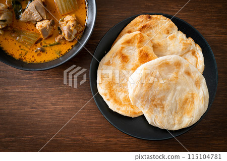 Chicken curry soup with roti Chicken curry soup with roti 115104781