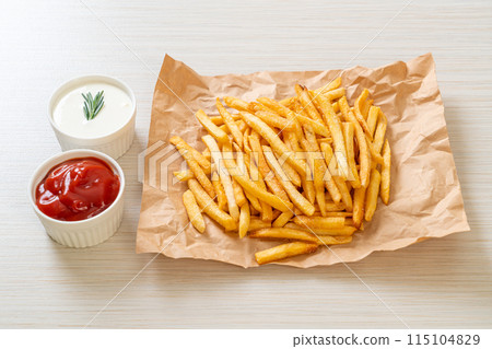 French fries with sour cream and ketchup French fries with sour cream and ketchup 115104829