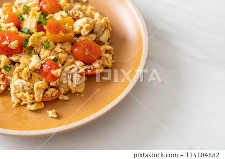 stir-fried tomatoes with egg on plate 115104882