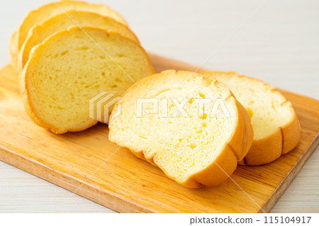 potatoes bread sliced on wood board potatoes bread sliced on wood board 115104917