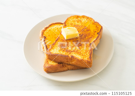 French toasted with butter and honey French toasted with butter and honey 115105125