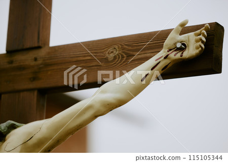 No people shot of arm part of Christ crucified sculpture located outdoors 115105344