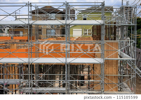Formwork being erected on the first floor (construction work) Formwork being erected on the first floor (construction work) 115105599