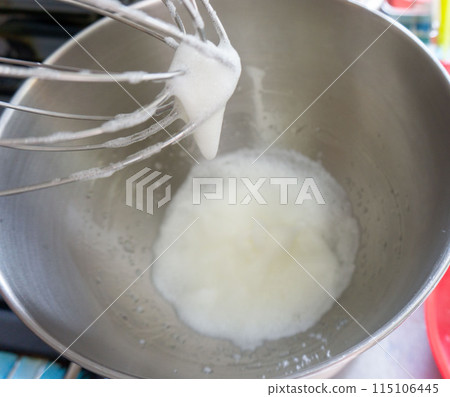 Photo of egg whites being whipped with a whisk Photo of egg whites being whipped with a whisk 115106445