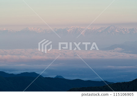 View of the Northern Alps and sea of clouds at dawn from Shiga Kogen View of the Northern Alps and sea of clouds at dawn from Shiga Kogen 115106905