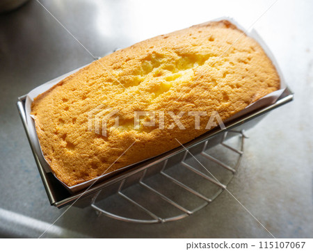 Pound cake cooling on a cake cooler Pound cake cooling on a cake cooler 115107067