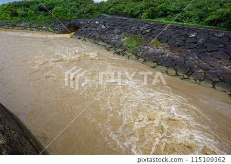 Environmental destruction: Red soil flows out after heavy rain Environmental destruction: Red soil flows out after heavy rain 115109362