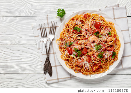 shrimp fra diavolo with spaghetti on a plate shrimp fra diavolo with spaghetti on a plate 115109578