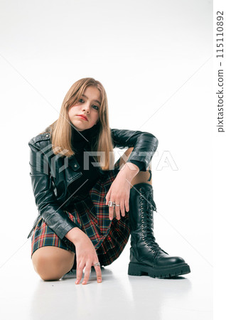 Young girl pouted. Studio portrait of sad teenage girl on white background Young girl pouted. Studio portrait of sad teenage girl on white background 115110892
