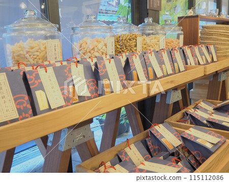 Traditional Shiga rice crackers on display in a store Traditional Shiga rice crackers on display in a store 115112086