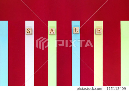 A red and white banner with colorful sticky notes with sale English blocks on top 115112409