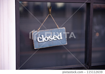 sorry we are closed sign hanging outside a restaurant, store, office or other sorry we are closed sign hanging outside a restaurant, store, office or other 115112639