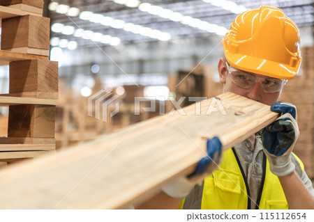 Man wearing safety uniform and yellow hard hat working checking quality wooden Man wearing safety uniform and yellow hard hat working checking quality wooden 115112654