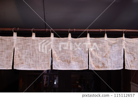 The curtain-like fabric that hangs in front of traditional Japanese restaurants and shops not only serves as a signboard, but holds a larger meaning, 115112657