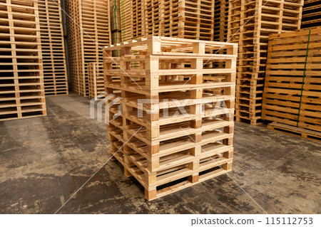 Stack of raw wood, Lumber warehouse storage wooden. Timber goods storehouse. 115112753