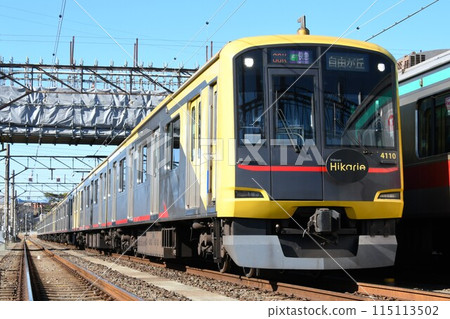 Tokyu Corporation 5050 series 4000 train (express/Jiyugaoka sign) parked at the depot 115113502