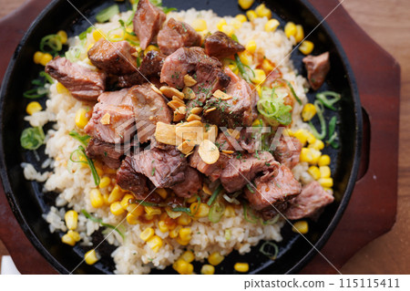 Delicious freshly made garlic steak rice 115115411