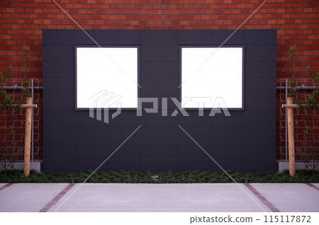Large blank billboard on a street wall, banners with room to add your own text 115117872
